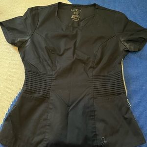 Jaanuu women’s size small black moto scrub set.  Excellent used condition.